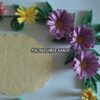 Purple Flowers With Small Yellow Flowers Greeting Card image