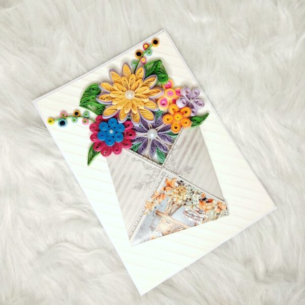 Quilled flowers in envelope greeting card