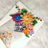 Quilled flowers in envelope greeting card