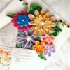 Quilled flowers in envelope greeting card