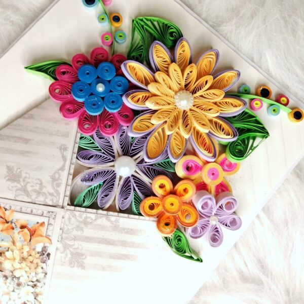 Quilled flowers in envelope greeting card