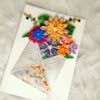 Quilled flowers in envelope greeting card