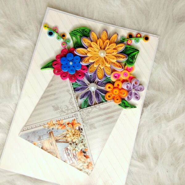 Quilled flowers in envelope greeting card