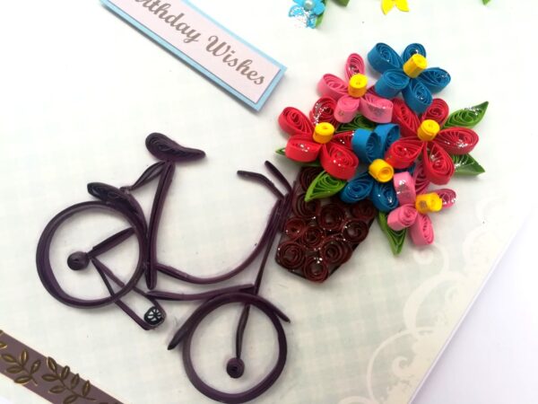 Quilled Cycle With Flowers Birthday Greeting Card image