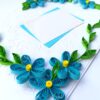 Quilled Blue Corner Flowers Greeting Card image