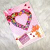 Vibrant quilled Heart greeting card