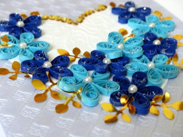Sparkling Blue Flowers In A Heart Greeting Card image