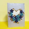 Sparkling Blue Flowers In A Heart Greeting Card image