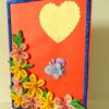 Beautiful Yellow And Pink Flowers On Red Greeting Card image