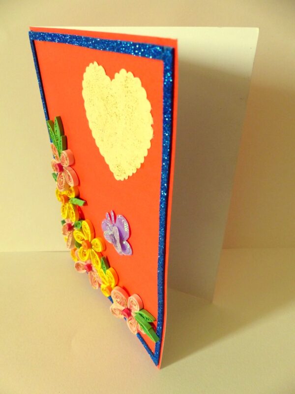 Beautiful Yellow And Pink Flowers On Red Greeting Card image