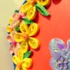Beautiful Yellow And Pink Flowers On Red Greeting Card image