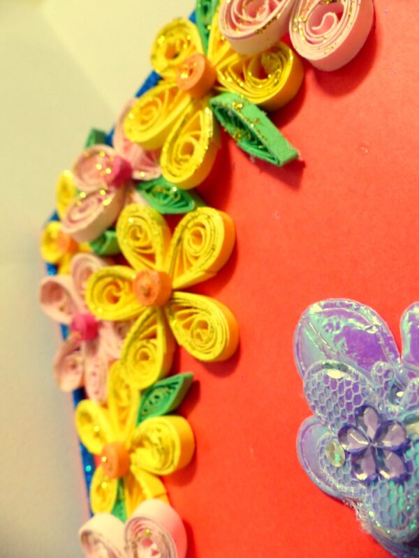 Beautiful Yellow And Pink Flowers On Red Greeting Card image