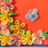 Beautiful Yellow And Pink Flowers On Red Greeting Card image