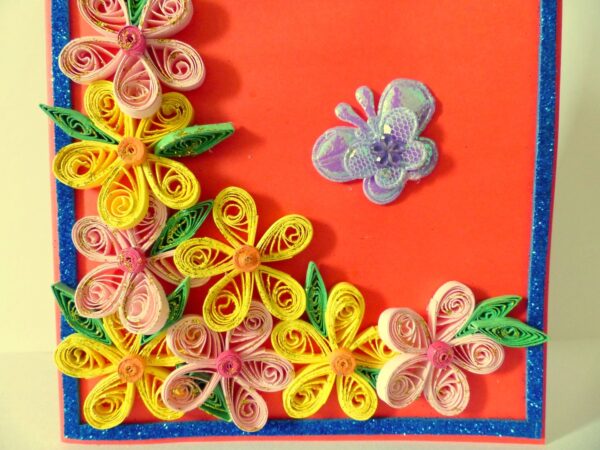 Beautiful Yellow And Pink Flowers On Red Greeting Card image