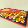 Beautiful Yellow And Pink Flowers On Red Greeting Card image