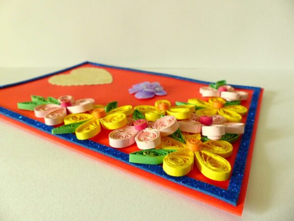 Beautiful Yellow And Pink Flowers On Red Greeting Card image