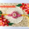Pink and Red Quilled Rakshabandhan Greeting Card image Pink and Red Quilled Rakshabandhan Greeting Card image