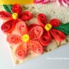 Pink and Red Quilled Rakshabandhan Greeting Card image Pink and Red Quilled Rakshabandhan Greeting Card image