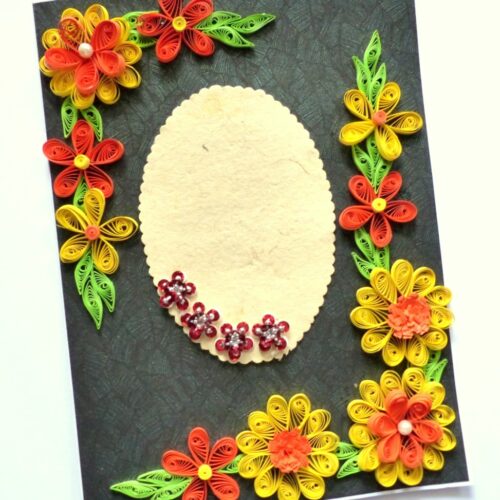 Yellow and Orange Quilled Flowers On Green Card image