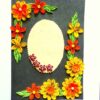 Yellow and Orange Quilled Flowers On Green Card image Yellow and Orange Quilled Flowers On Green Card image