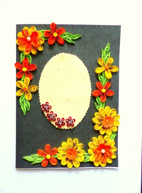 Yellow and Orange Quilled Flowers On Green Card image Yellow and Orange Quilled Flowers On Green Card image