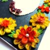 Yellow and Orange Quilled Flowers On Green Card image Yellow and Orange Quilled Flowers On Green Card image