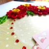Red Quilled Flowers in Corner Greeting Card image